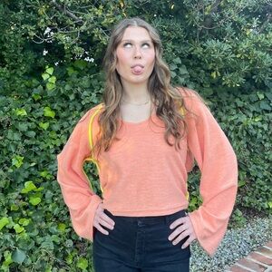 UO wide sleeve open back sweater